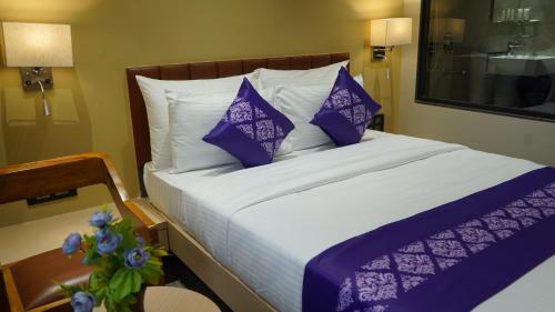 Gallery image of Purple Beds by VITS Dwarkesh, Surat in Salabatpura