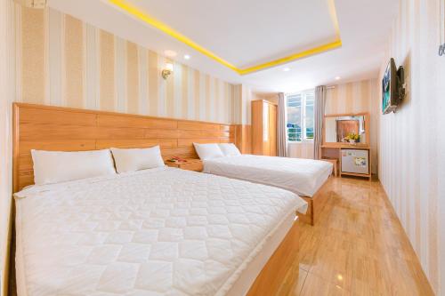 Odessa hotel tesisinde bir odada yatak veya yataklar