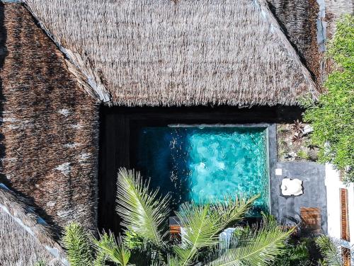 a window on the side of a building at Akasia Villas in Gili Islands
