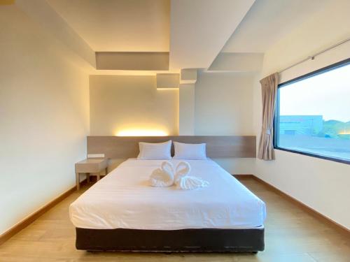 Postel nebo postele na pokoji v ubytování View Dee BKK Airport Residence