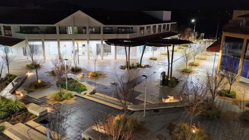 an overhead view of a courtyard with a building at Tuggeranong Short Stay #07 - Sleeps 6 in Tuggeranong