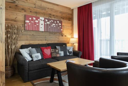 Zona de estar de Apartment Adler Resort by Alpin Rentals - incl Summercard