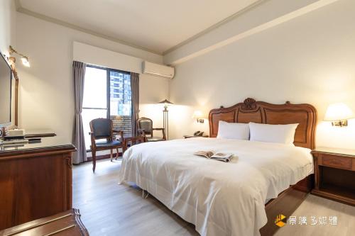 Postel nebo postele na pokoji v ubytování Spring Hotel