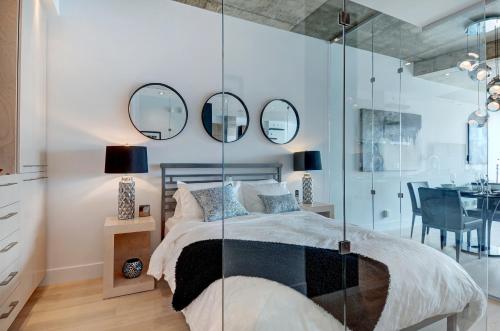 Tempat tidur dalam kamar di Les Immeubles Charlevoix - Le 760610