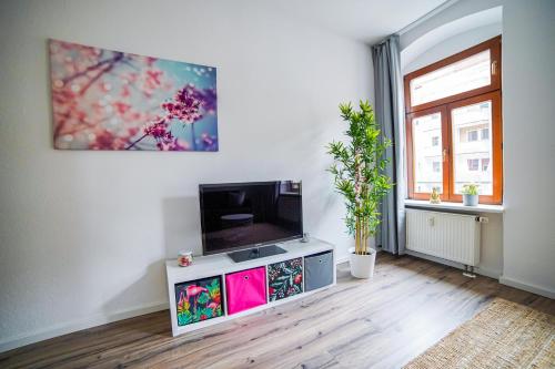 TV a/nebo společenská místnost v ubytování FullHouse - Chemnitz - M45 Apartments