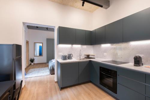 Kuchyň nebo kuchyňský kout v ubytování Valletta Collection - Felix Apartments
