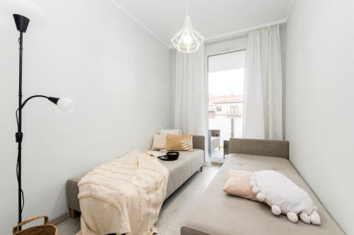 Katil atau katil-katil dalam bilik di Apartament Baltic Sun