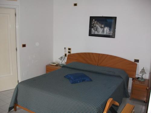 Postel nebo postele na pokoji v ubytování Holidays Baia D'Amalfi