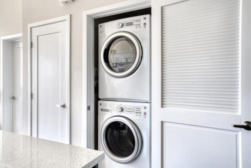 a white laundry room with a washer and dryer at Redwood City 2BR w AC Gym WD nr Caltrain SFO-1110 in Redwood City