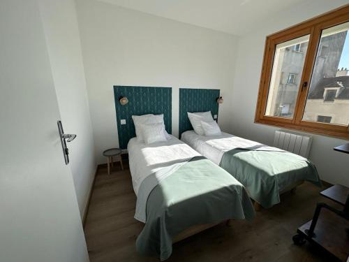 Posteľ alebo postele v izbe v ubytovaní La Galonière Noire, appartement vue mer