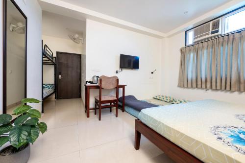 Ένα ή περισσότερα κρεβάτια σε δωμάτιο στο House of Backpackers
