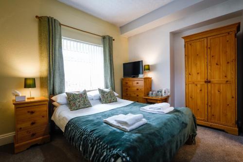 Ένα ή περισσότερα κρεβάτια σε δωμάτιο στο Waverley B & B
