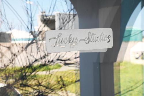 a sign that reads happy holidays on a window at Lucky 4 in Paralimni