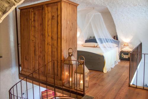 En eller flere senge i et værelse på Paradise Suites At The Pier Of Brienno - The House Of Travelers