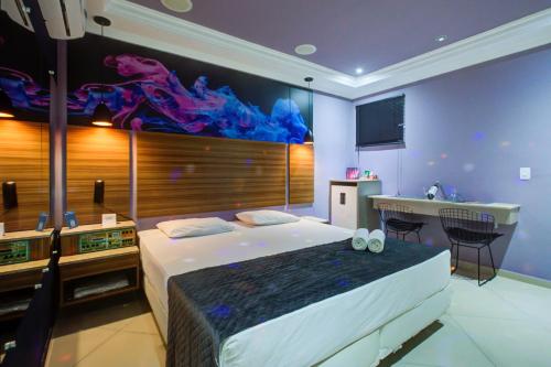 Ένα ή περισσότερα κρεβάτια σε δωμάτιο στο Soft Motel - USP