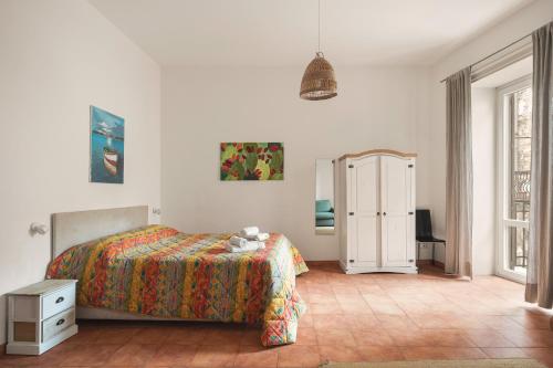 Postel nebo postele na pokoji v ubytování Piazza Marina Open Space