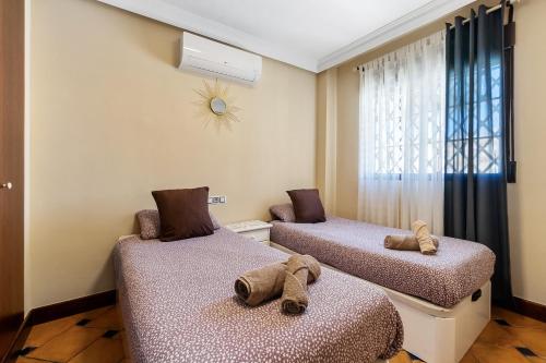 Ένα ή περισσότερα κρεβάτια σε δωμάτιο στο FH MEDITERRANEO