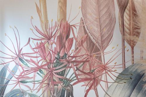 a painting of flowers in a vase with leaves at BOTANIC GUESTHOUSE ESTE in Este