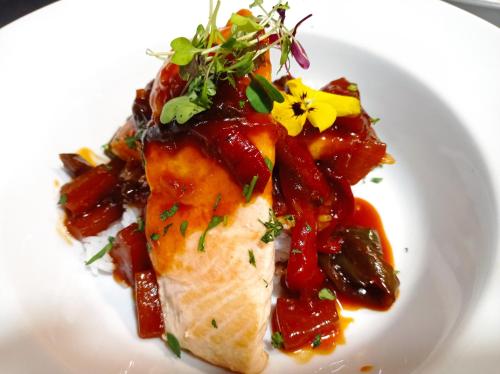 a plate of food with a dish of food at Hotel La Casa in Torrox