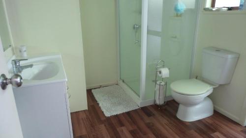 Ванна кімната в Hahei Beach Escape