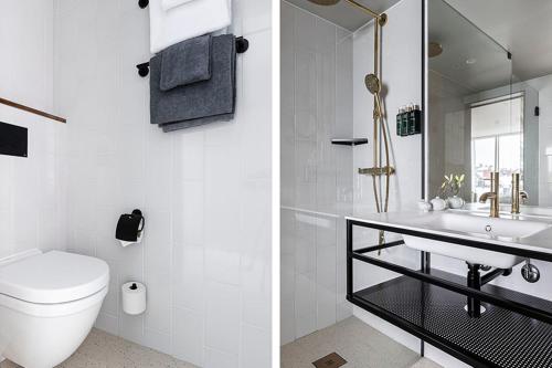 La salle de bains blanche est pourvue de toilettes et d'un lavabo. dans l'établissement Clarion Hotel Amaranten, à Stockholm