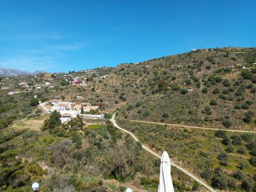 a view of a winding road on a hill at Hotel La Casa in Torrox