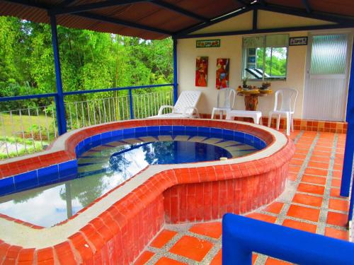 Bazén v ubytování Hotel Campestre El Refugio de Balsora nebo v jeho okolí