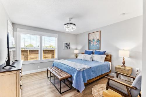 a bedroom with a bed and a window at Brand New Bungalow with King Bed Suites in St Aug in Saint Augustine