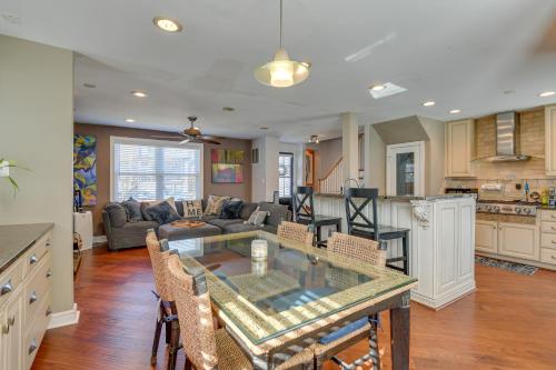 a kitchen and living room with a table and a couch at WFH-Friendly Vacation Rental in DC! in Washington, D.C.