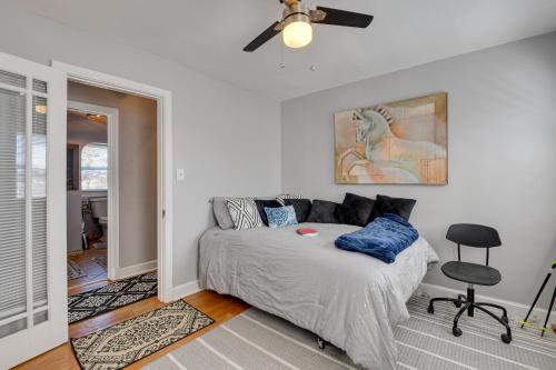 a bedroom with a bed and a ceiling fan at WFH-Friendly Vacation Rental in DC! in Washington