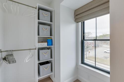 a room with a window and a shelf with drawers at Provincetown Vacation Rental Pet Friendly! in Provincetown