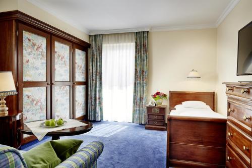 Postel nebo postele na pokoji v ubytování Hotel Hirlanda