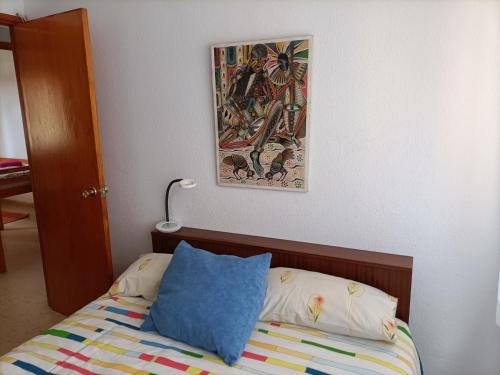 A bed or beds in a room at Las Palmas - Hasta 6 Personas