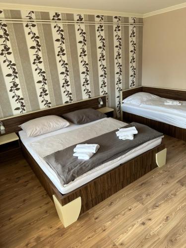 Cama o camas de una habitación en Home Sweet Apartment XL