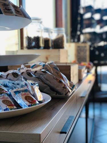 two plates of food on a counter in a store at Santa Lucia in Capo dʼOrlando