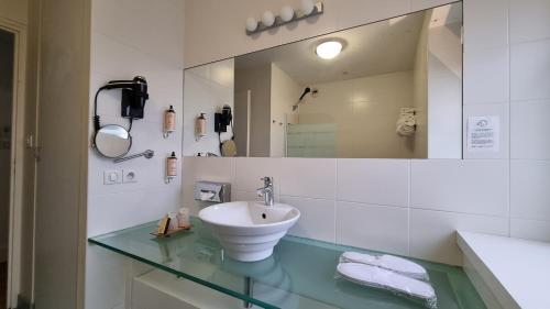 Un baño de Les Sables Blancs