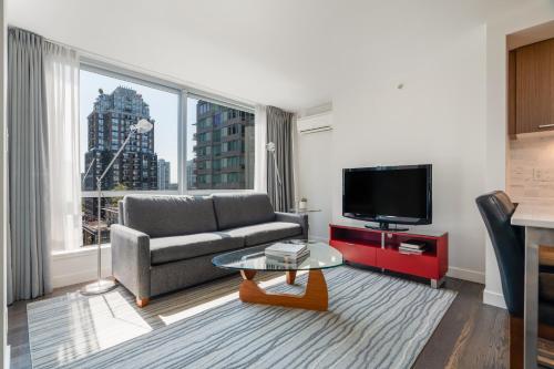 Televiisor ja/või meelelahutuskeskus majutusasutuses Level Vancouver Yaletown - Seymour