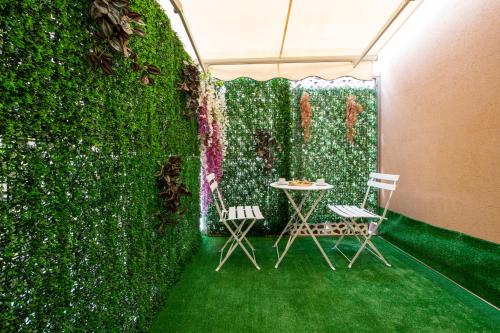 Κήπος έξω από το FASHION APARTMENT GOLD Bologna with JACUZZI & CAR GARAGE