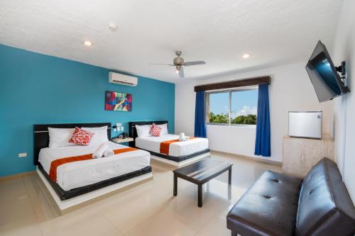 TV a/nebo společenská místnost v ubytování Hotel Playa Encantada
