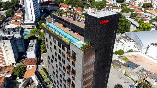 an overhead view of a building with a hilton sign on it at TOLIVE One Housi Recife by Carpediem in Recife