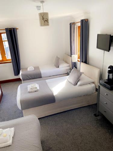Кровать или кровати в номере Victoria House Bed and Breakfast