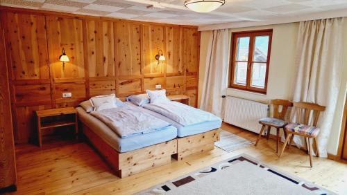 Postel nebo postele na pokoji v ubytování Gasthof Dorfschenke
