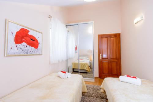 Ένα ή περισσότερα κρεβάτια σε δωμάτιο στο Apartment Denis