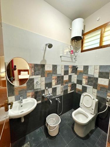 Ванная комната в Sri Apartment Deluxe Room A3