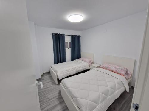 Postel nebo postele na pokoji v ubytování Apartamento con vistas al mar