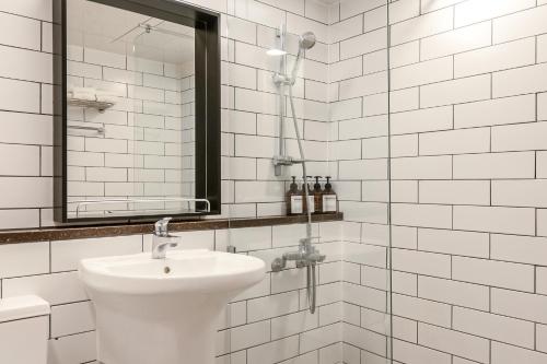 Un baño de Heyy Seogwipo Hotel
