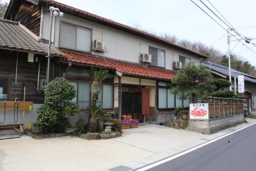 a house on the side of a street at Minshuku Oe in Kyotango
