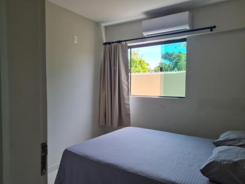 Postel nebo postele na pokoji v ubytování MACOCA TAMANDARÉ FLAT