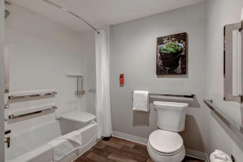 a white bathroom with a toilet and a shower at TownePlace Suites by Marriott San Luis Obispo in San Luis Obispo