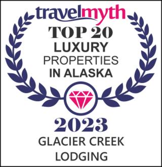 a logo for a top luxury properties in albia at Glacier Creek Lodging in Seward